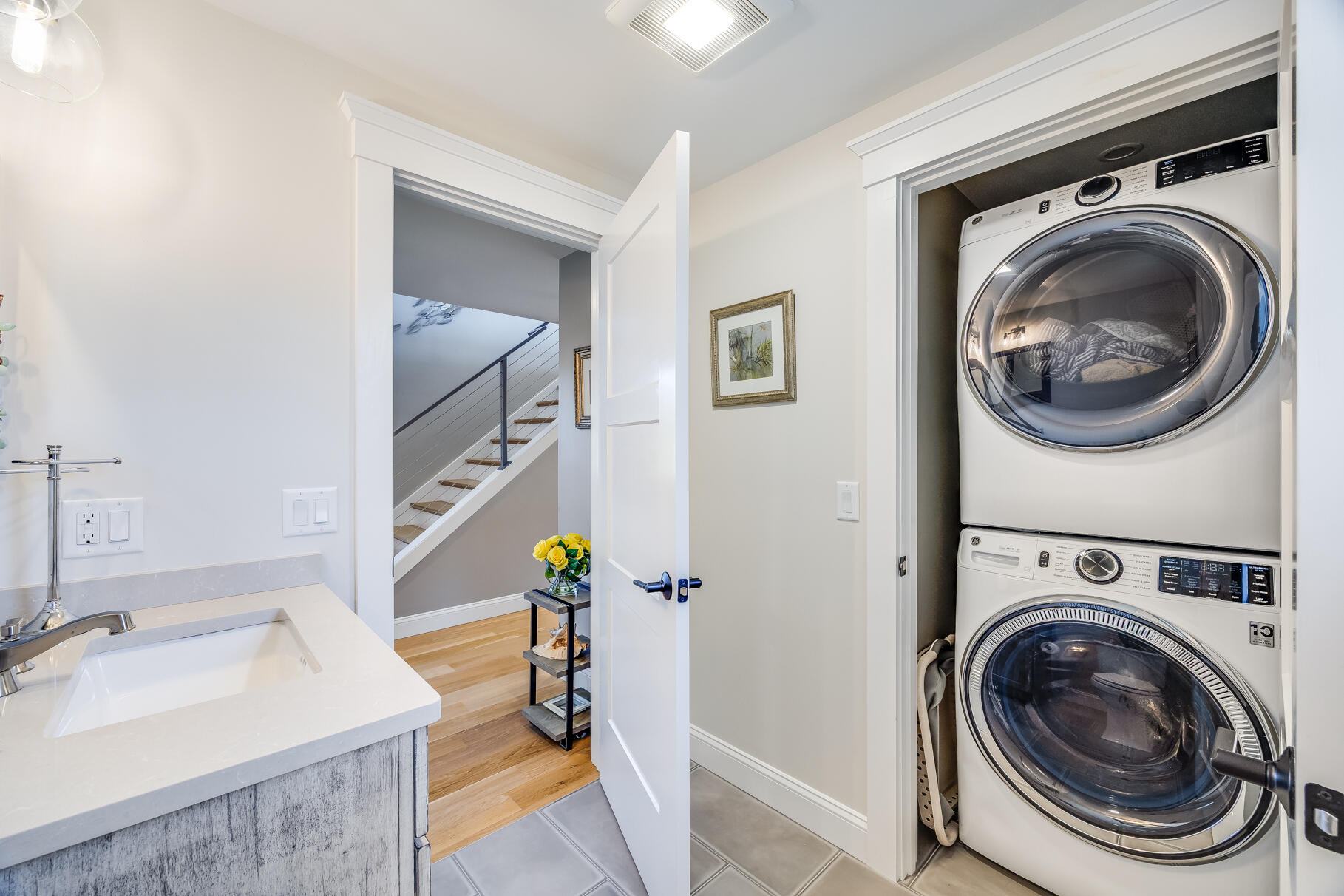 87 Oyster Pond Road Falmouth, MA 02540 - Photo 52 of 105 a utility room with sink dryer and washer