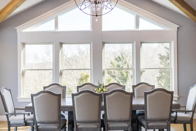 a kitchen with stainless steel appliances a stove refrigerator sink and cabinets