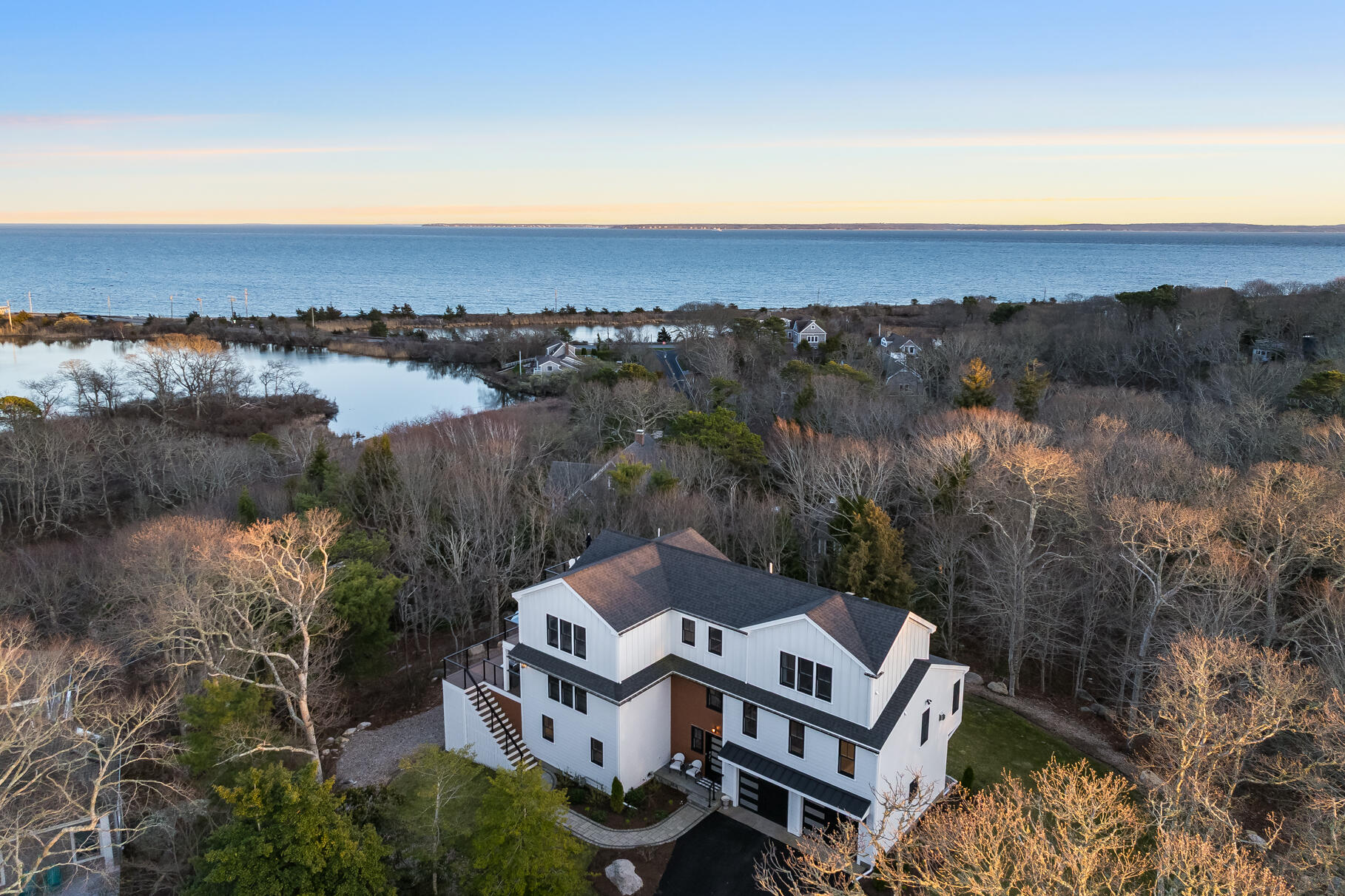 87 Oyster Pond Road Falmouth, MA 02540 - Photo 83 of 105 an aerial view of a house with mountain view