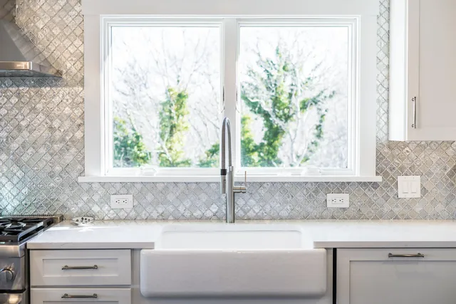 a view of a dining room with furniture wooden floor and a flat screen tv