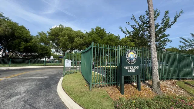a sign board with garden view