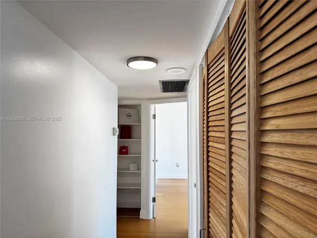 a view of bathroom with tub and shower