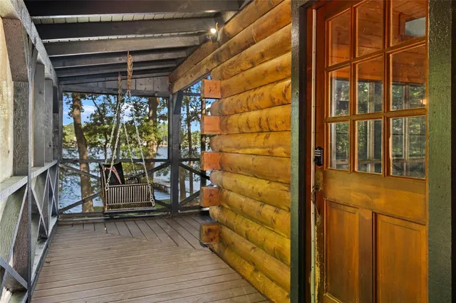 a view of front door and wooden floor