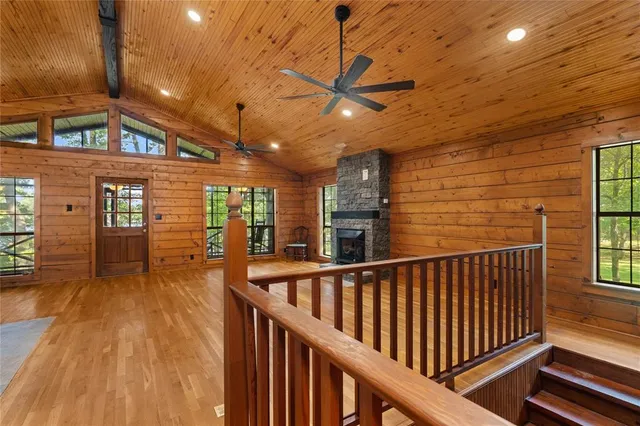 a view of a porch with wooden floor