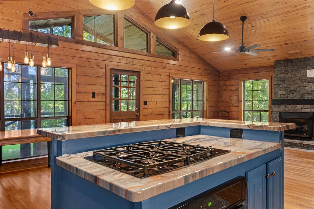 295 Coleman Road Homer, LA 71040 - Photo 13 of 38 a kitchen with stainless steel appliances granite countertop a stove and a sink