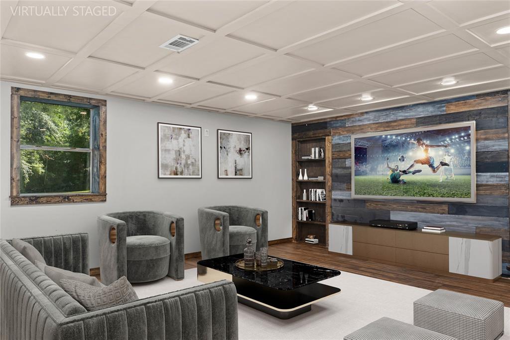 295 Coleman Road Homer, LA 71040 - Photo 23 of 38 a living room with furniture and a flat screen tv