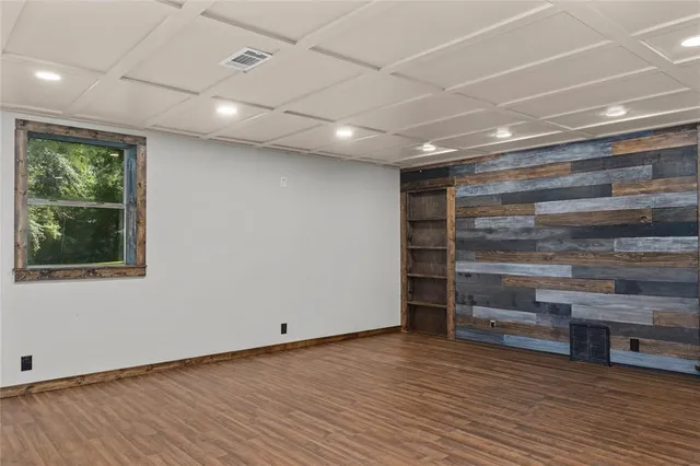 a kitchen with stainless steel appliances granite countertop a stove and a sink