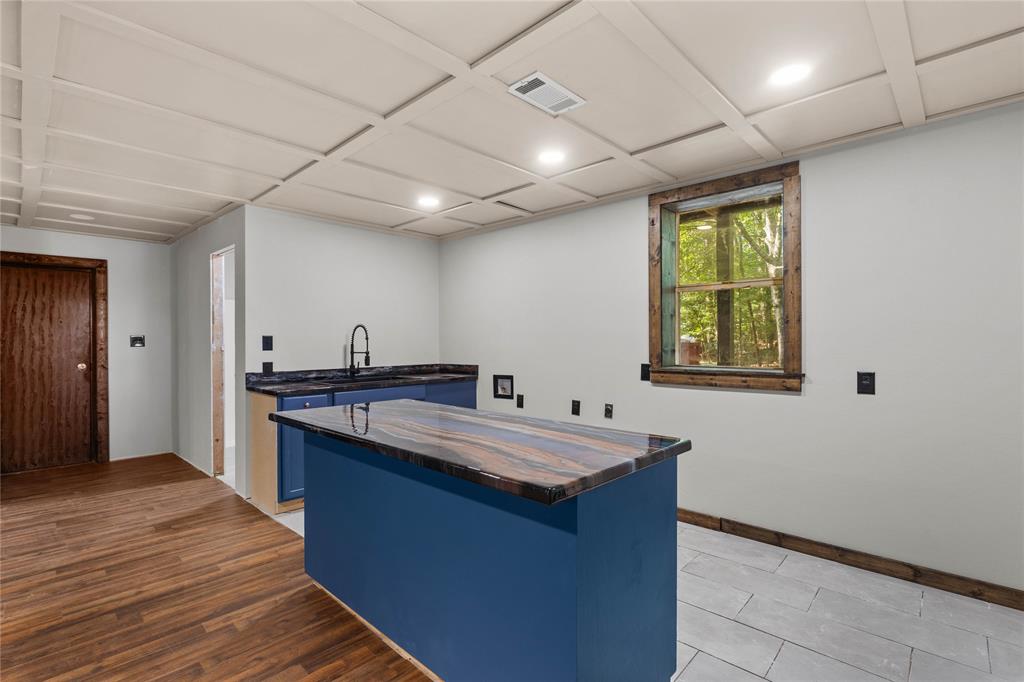 295 Coleman Road Homer, LA 71040 - Photo 25 of 38 a kitchen with a stove and a sink