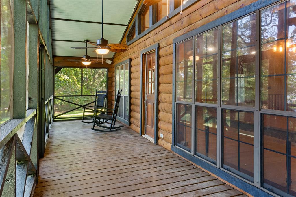 295 Coleman Road Homer, LA 71040 - Photo 29 of 38 a view of a porch with wooden floor and furniture