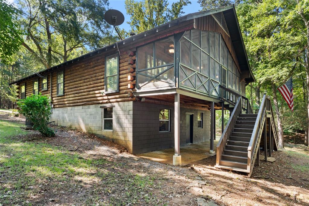 295 Coleman Road Homer, LA 71040 - Photo 31 of 38 a view of a house with a large tree front of house