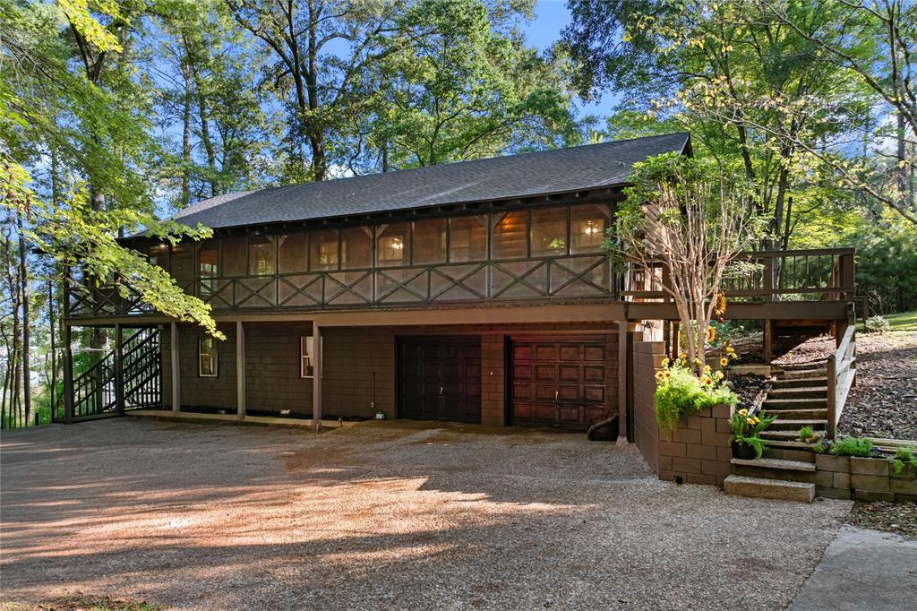 295 Coleman Road Homer, LA 71040 - Photo 32 of 38 a view of a house with a yard and plants