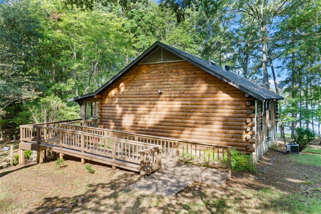 295 Coleman Road Homer, LA 71040 - Photo 33 of 38 a view of a house with a small wooden fence