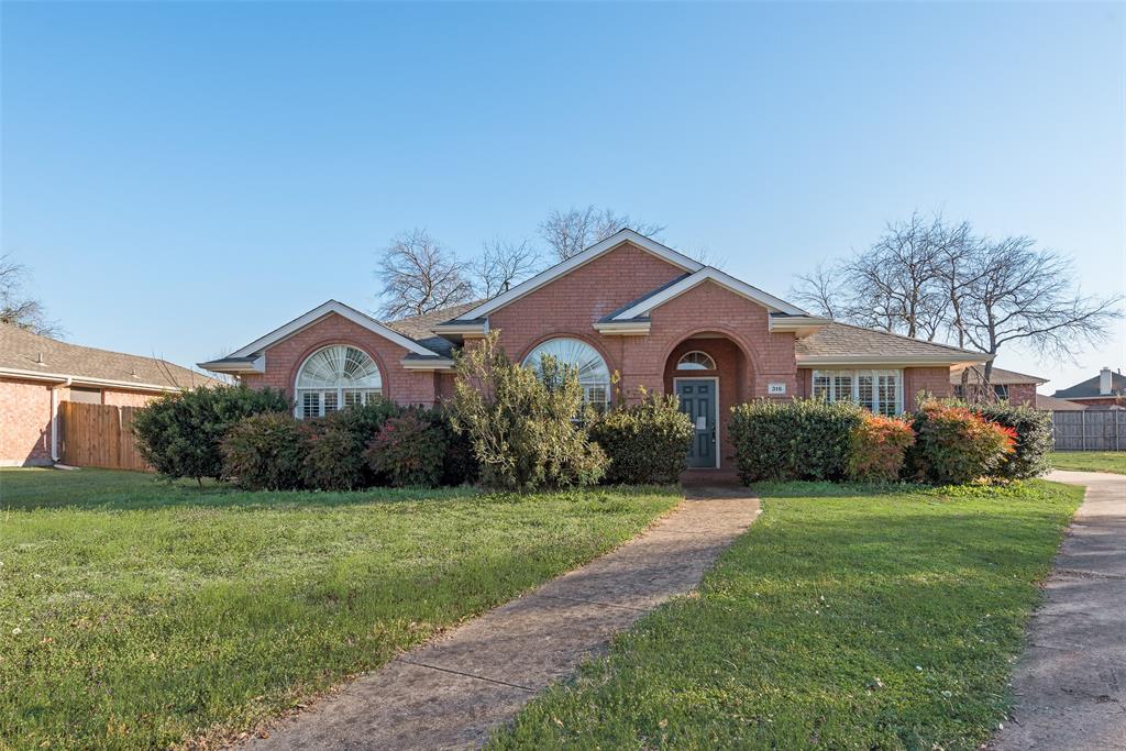 316 Rainhurst Lane Murphy, TX 75094 - Photo 1 of 1 a front view of a house with garden