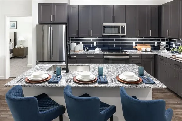 a table and chairs in a kitchen