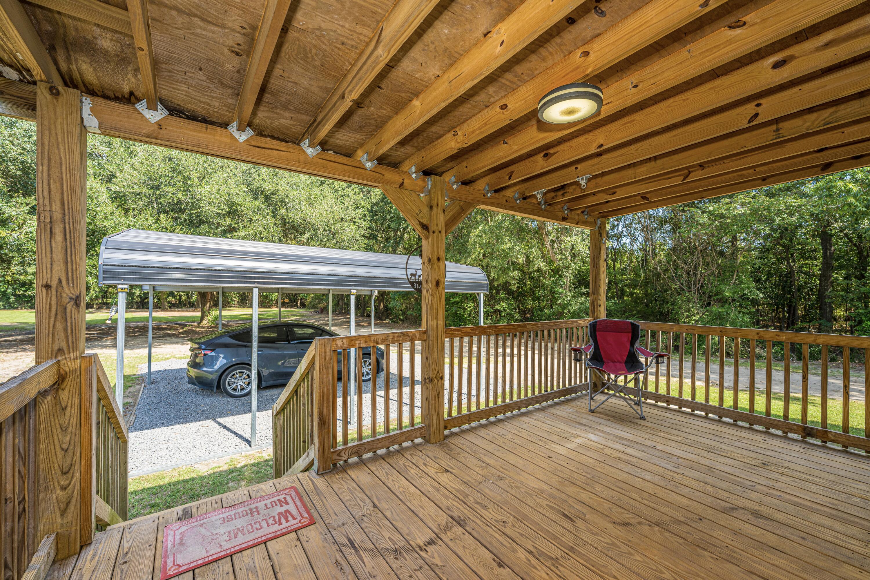 151 Church Road St. Stephen, SC 29479 - Photo 32 of 43 Rear covered patio deck