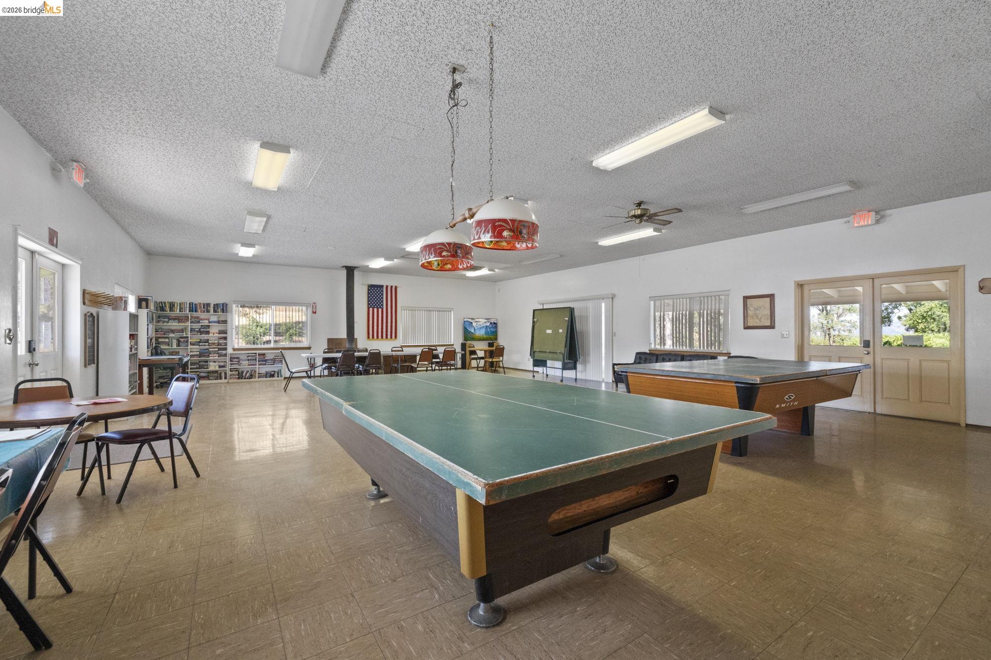 8400 Old Melones Road Jamestown, CA 95327 - Photo 16 of 23 a room with pool table table and chairs