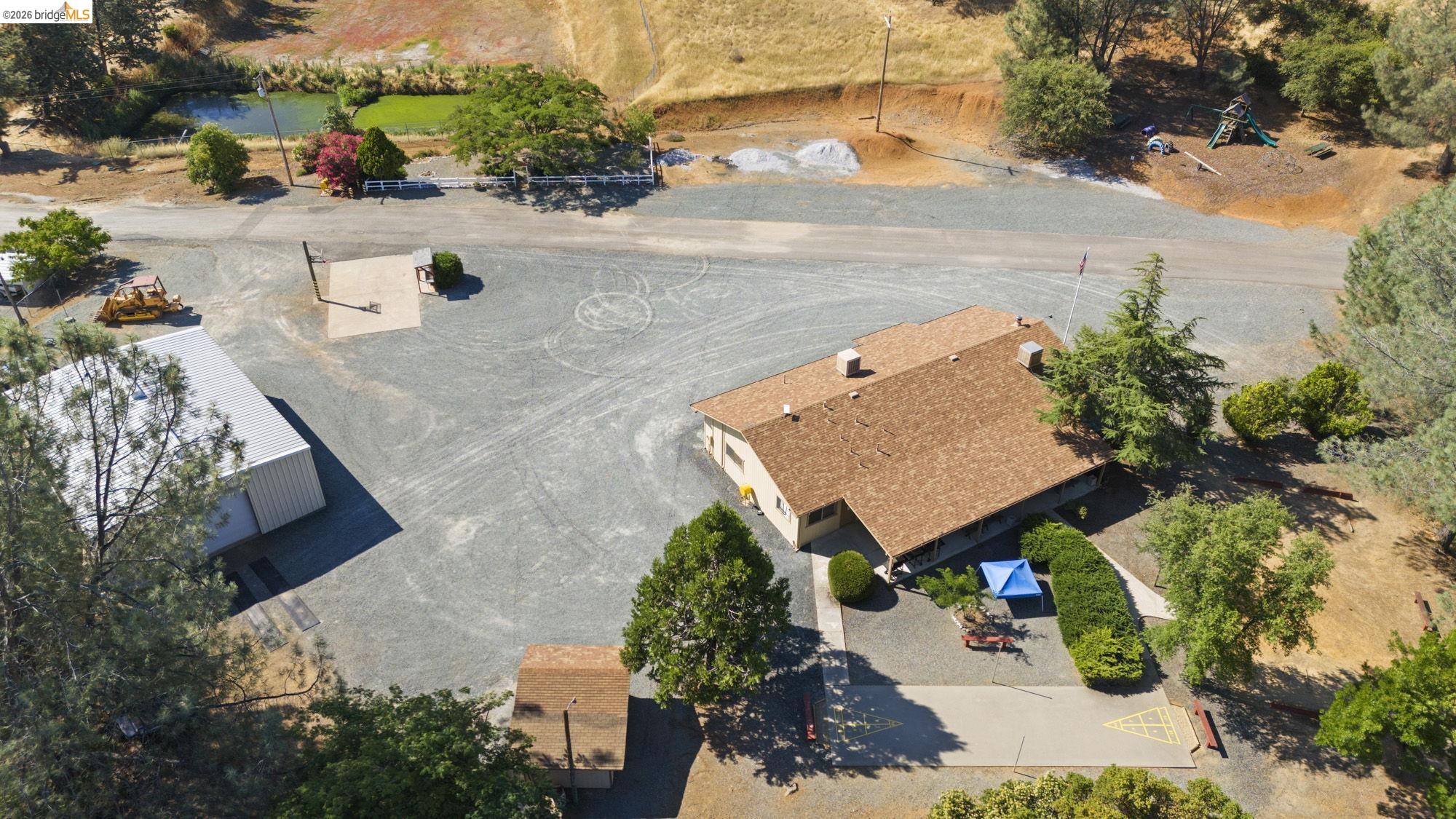 8400 Old Melones Road Jamestown, CA 95327 - Photo 19 of 23 an aerial view of a house with a yard