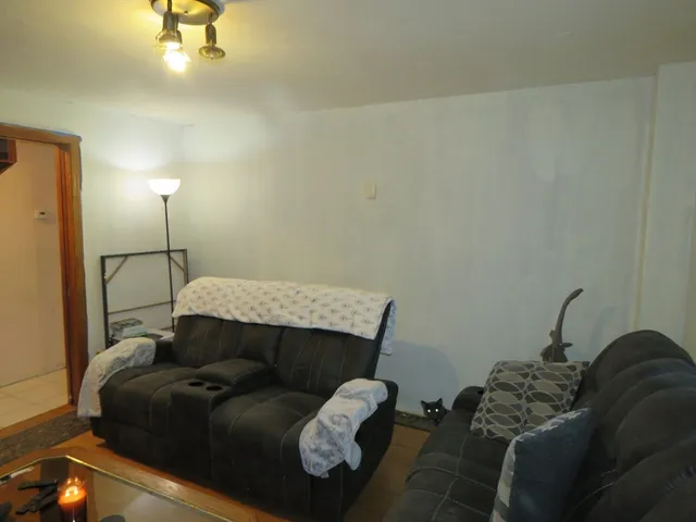 a living room with furniture and a couch