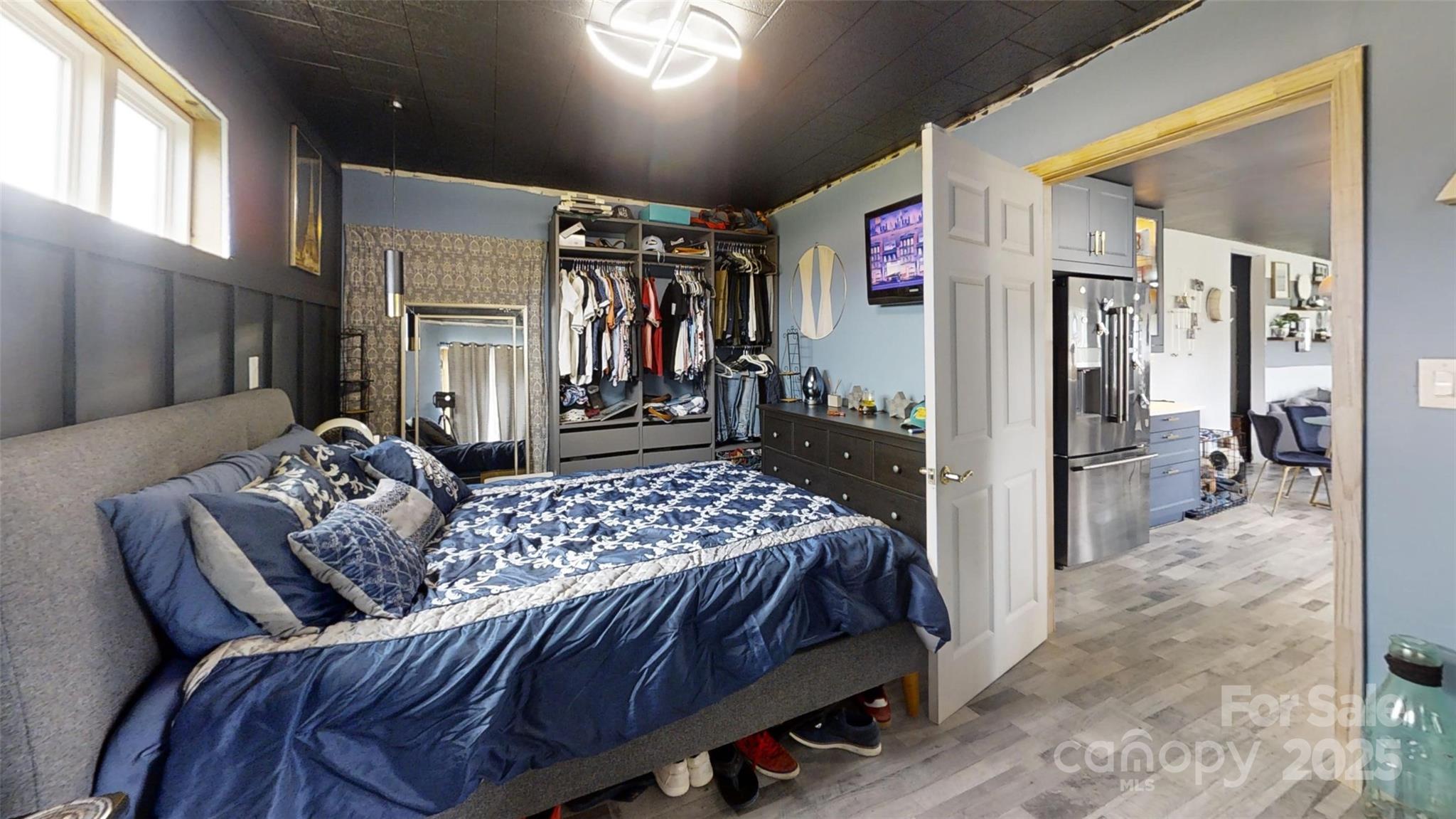 751 Northbrook III School Road Vale, NC 28168 - Photo 6 of 11 a bedroom with a bed couch and view of living room