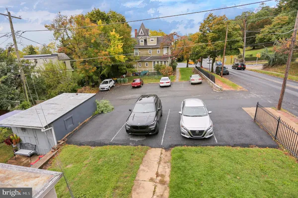 a view of a street with cars