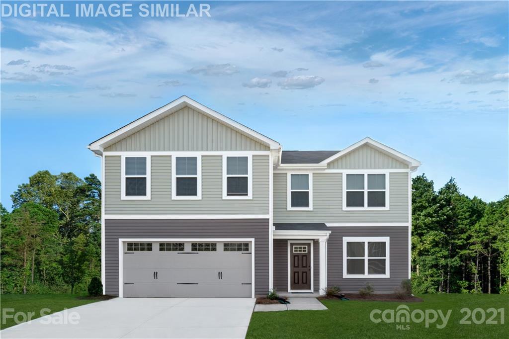 5125 Tinker Field Road, Unit 2019 Charlotte, NC 28215 - Photo 1 of 10 a front view of a house with a yard