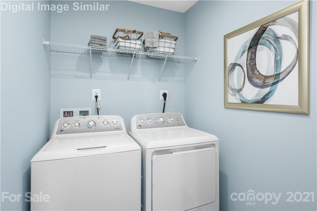 5125 Tinker Field Road, Unit 2019 Charlotte, NC 28215 - Photo 9 of 10 a utility room with dryer and washer