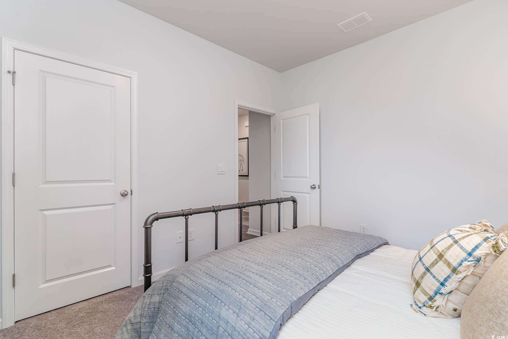 365 Rookroost Circle Conway, SC 29526 - Photo 20 of 21 Bedroom featuring light carpet