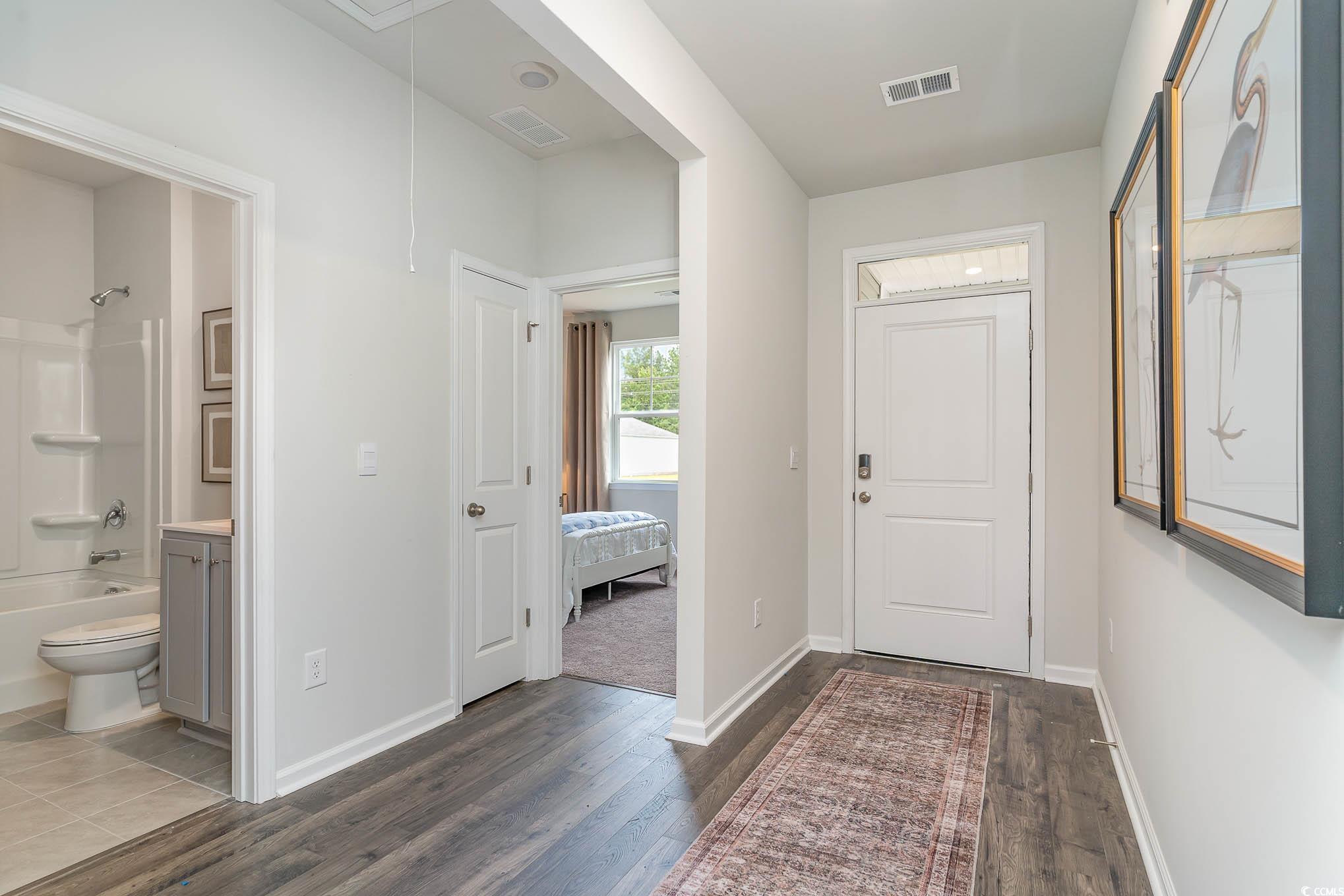 365 Rookroost Circle Conway, SC 29526 - Photo 2 of 21 Foyer featuring dark hardwood / wood-style floorin