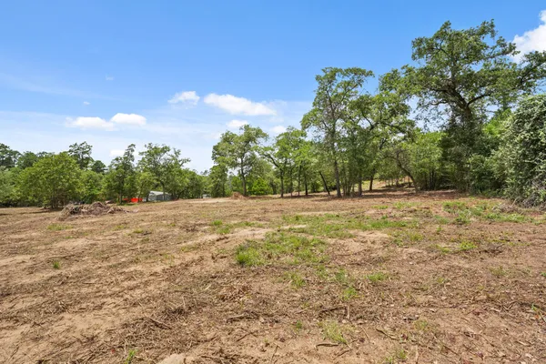 a view of outdoor space with deck and yard