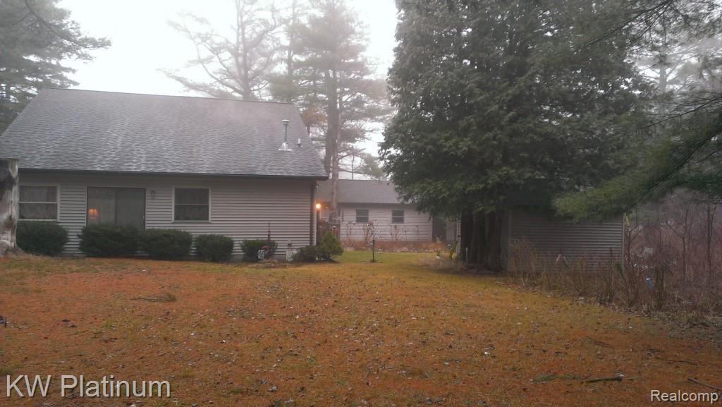 7230 Harrington Road Lexington, MI 48450 - Photo 9 of 46 Ext west side of house.jpg