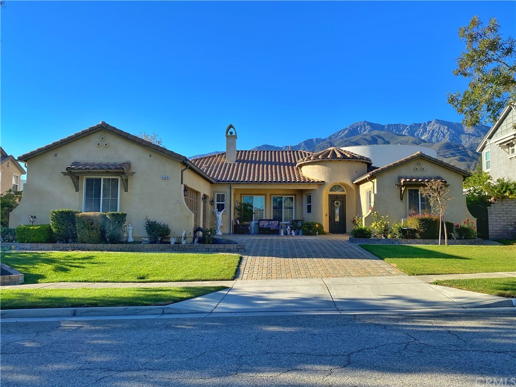 5440 Stoneview Road Rancho Cucamonga, CA 91739 - Photo 1 of 1 a view of a house with swimming pool and yard