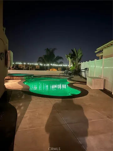 a view of a balcony with chairs