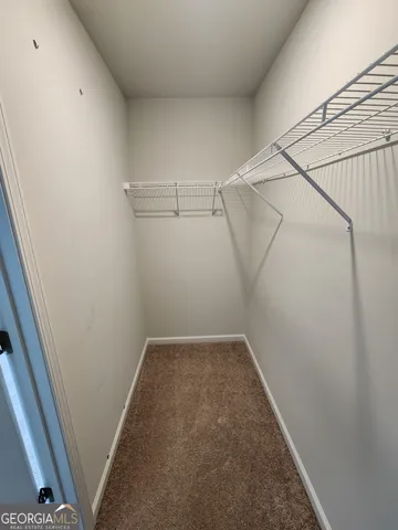 a view of a room with racks on the wall