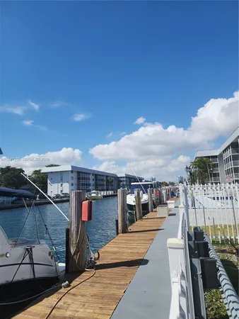 a view of a balcony with sitting area