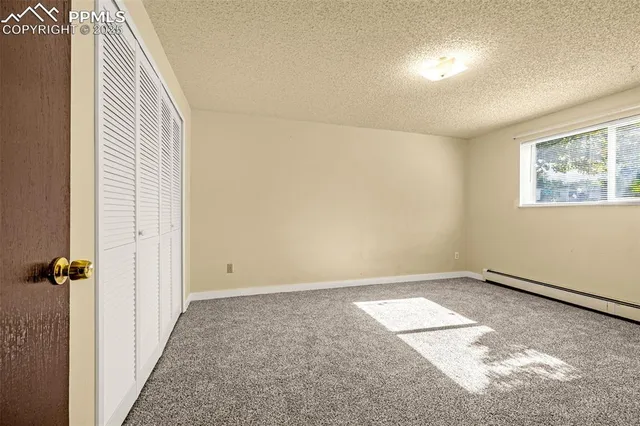an empty room with closet