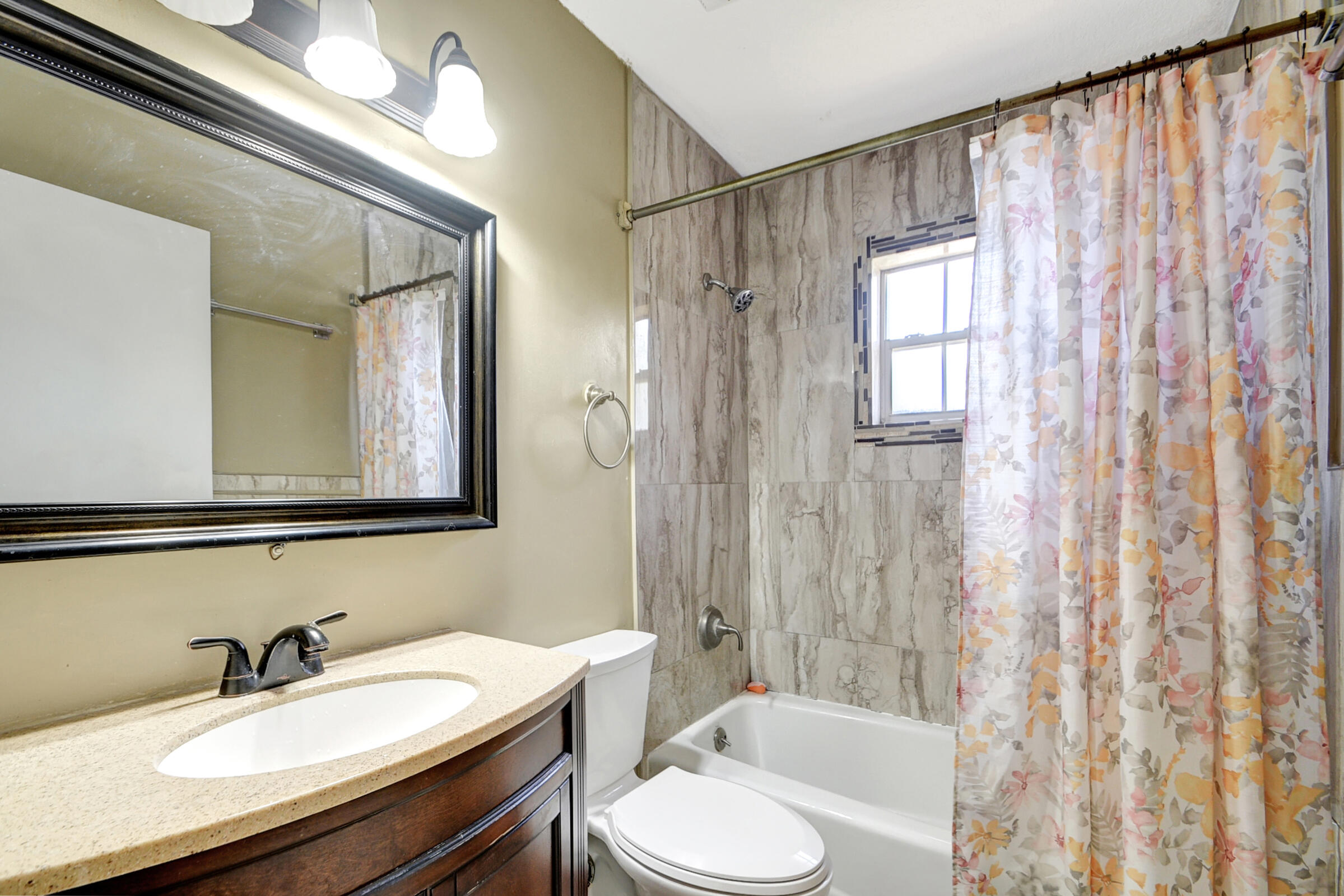 10128 Boynton Pl Circle Boynton Beach, FL 33437 - Photo 16 of 25 a bathroom with a sink toilet and shower