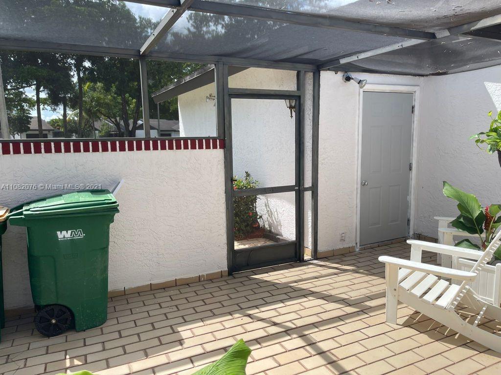 6449 Pinehurst Circle, Unit C25 Tamarac, FL 33321 - Photo 15 of 22 a view of a door front of house