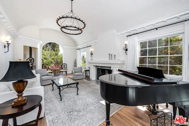 a kitchen with stainless steel appliances kitchen island granite countertop a sink and cabinets