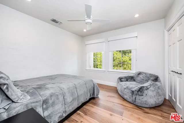 a kitchen with stainless steel appliances granite countertop a stove and cabinets