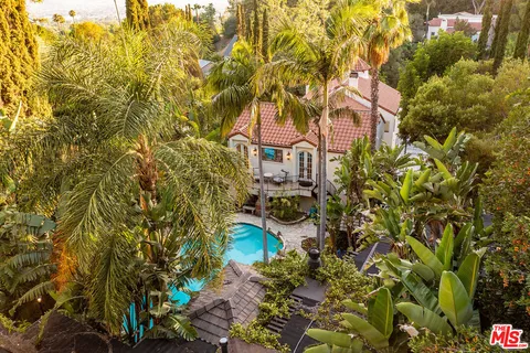 a view of swimming pool with outdoor seating
