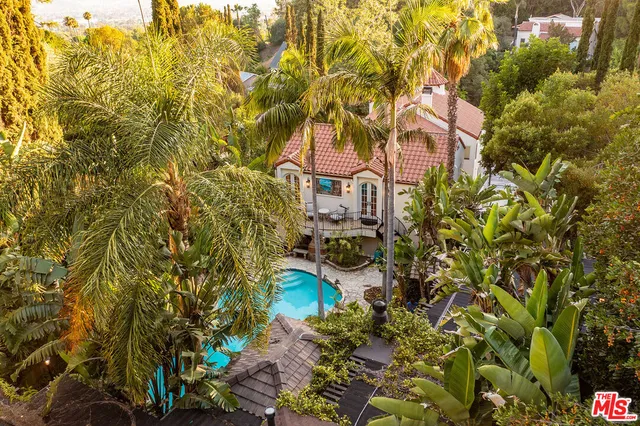 a view of swimming pool with outdoor seating