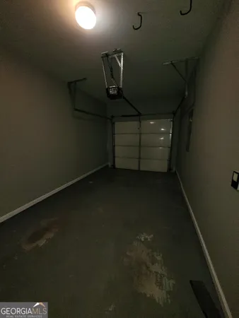 a view of empty room with windows