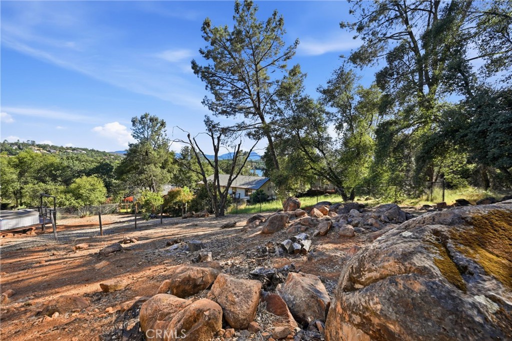 18685 Oak Grove Road Hidden Valley Lake, CA 95467 - Photo 22 of 52 a view of a road with trees