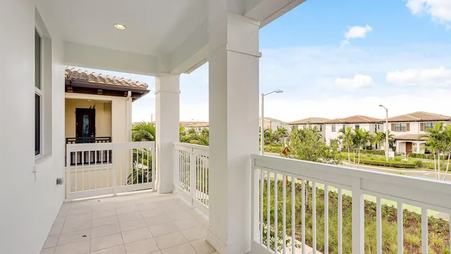 a bedroom with a bed and a mirror