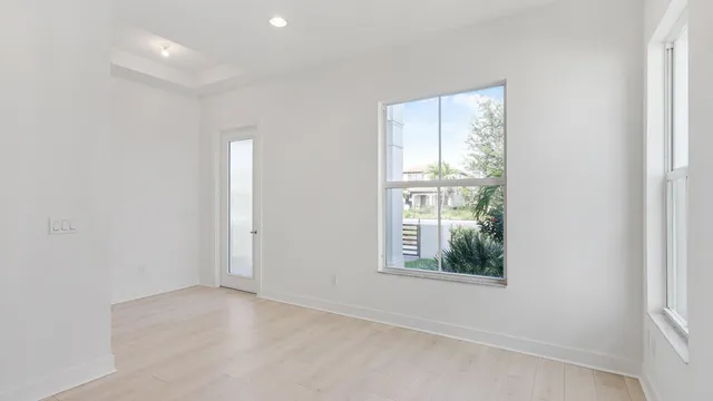 an empty room with windows