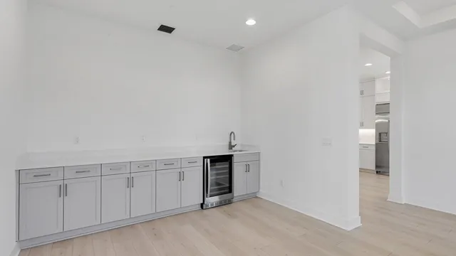 a view of a kitchen with a sink