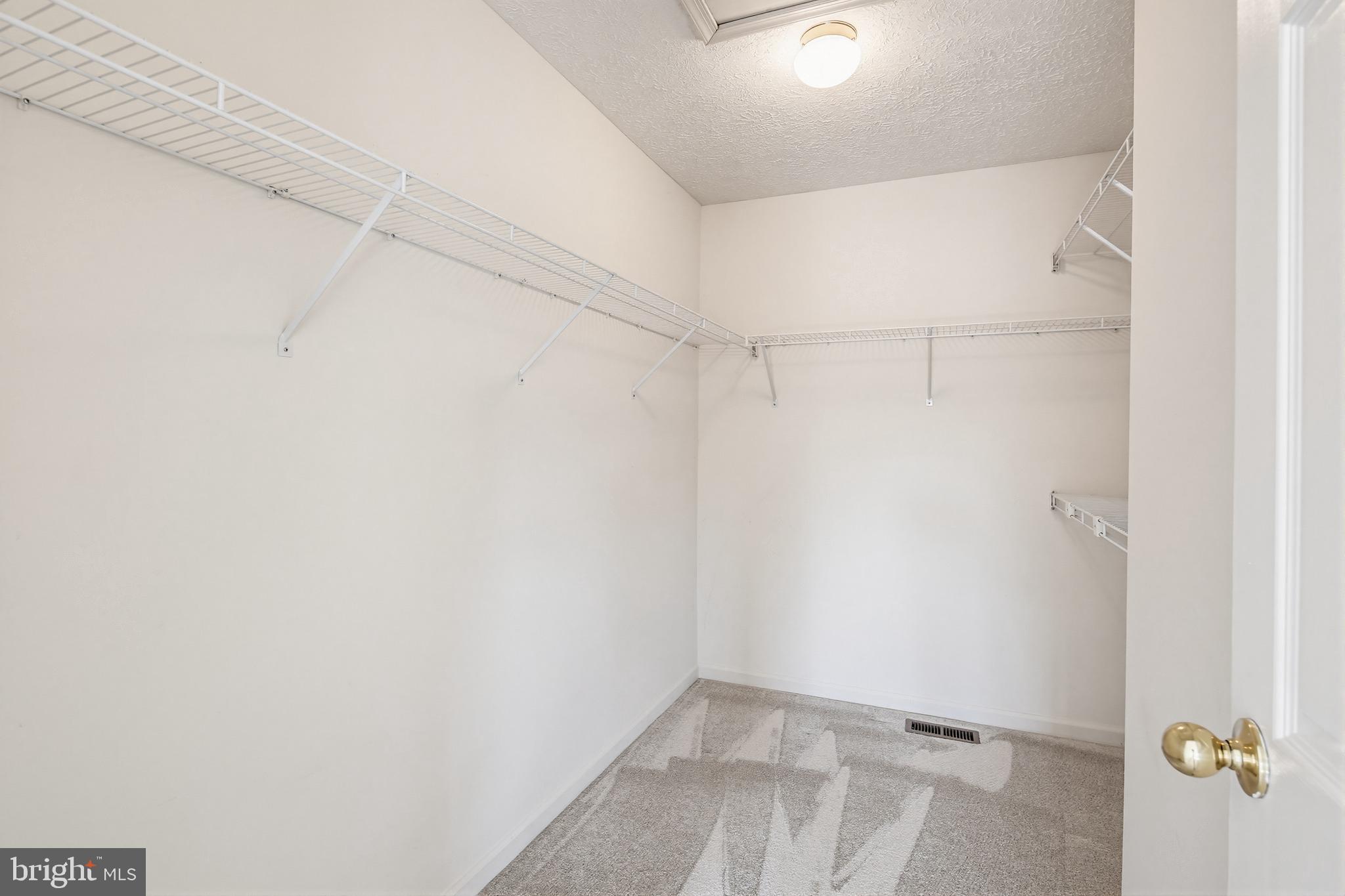 8266 Spring Branch Court Laurel, MD 20723 - Photo 34 of 73 Walk-in closet in primary bedroom