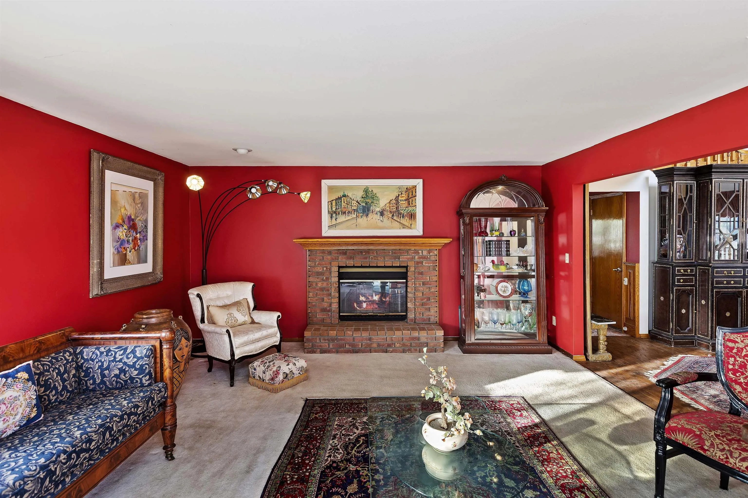 2109 Old Bridge Road Riverside, CA 92506 - Photo 16 of 57 a living room with furniture a rug and a fireplace
