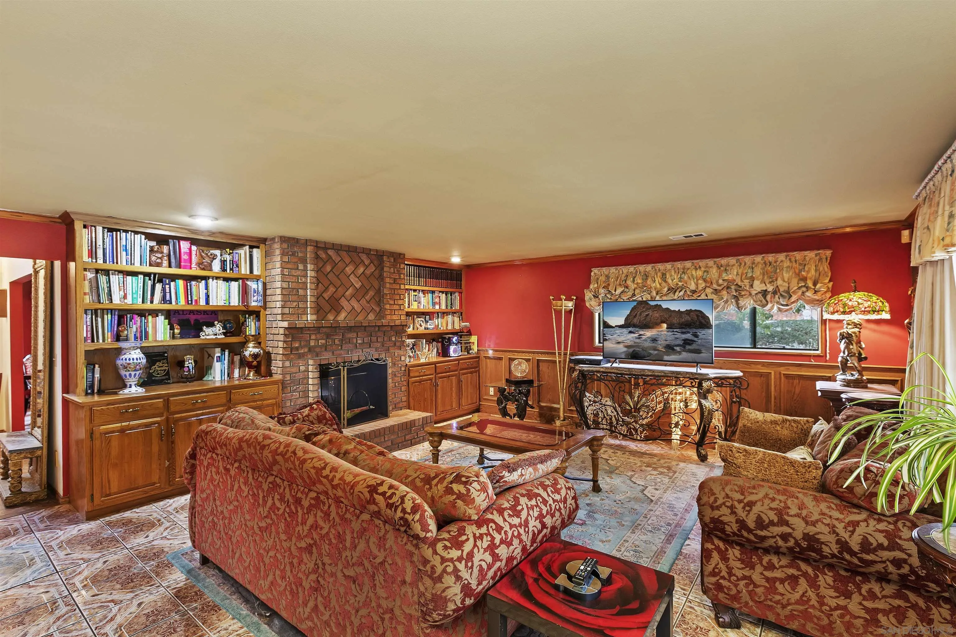 2109 Old Bridge Road Riverside, CA 92506 - Photo 22 of 57 a living room with fireplace furniture and a large window