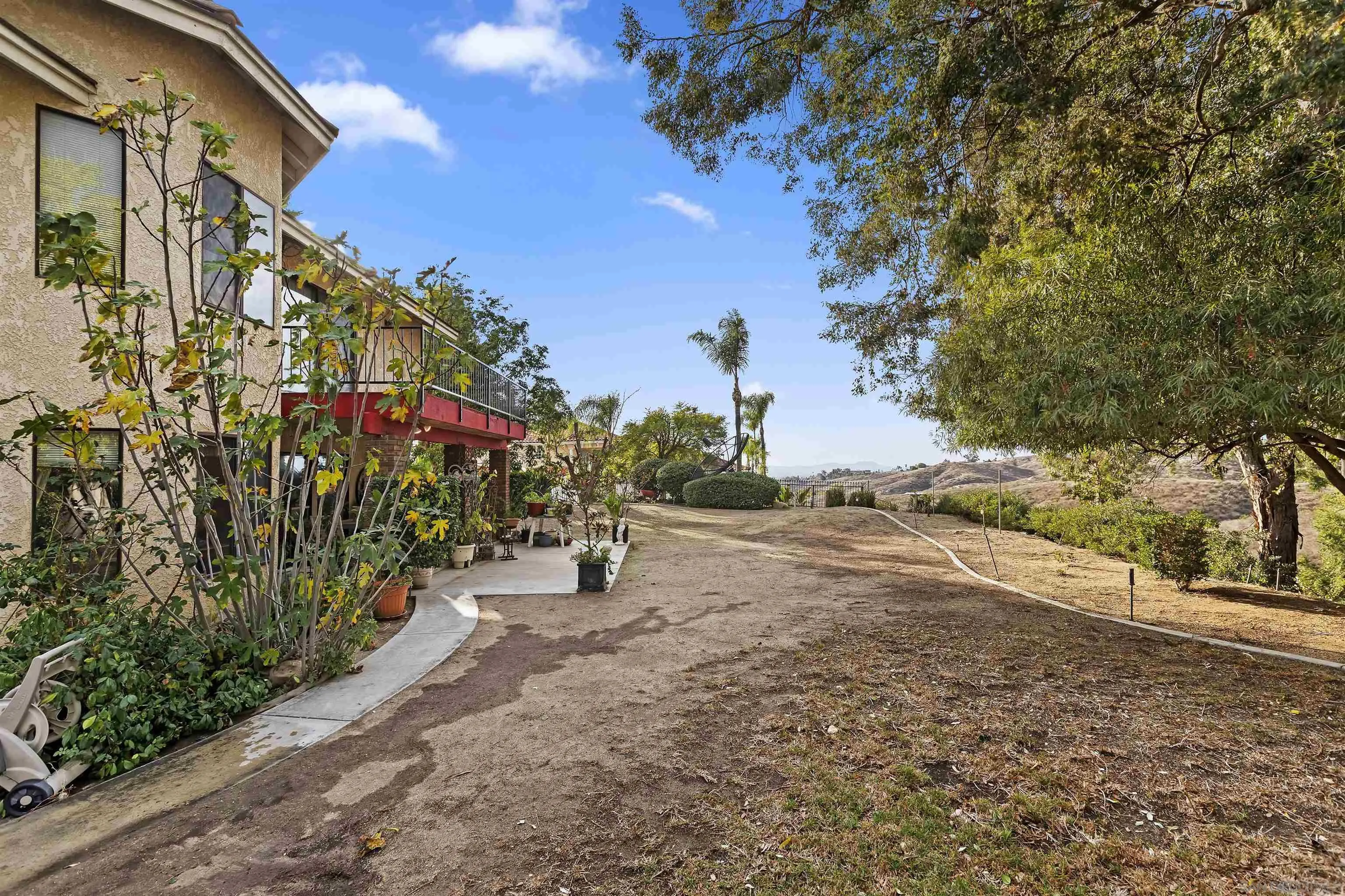 2109 Old Bridge Road Riverside, CA 92506 - Photo 44 of 57 a view of a street with trees on both side of it